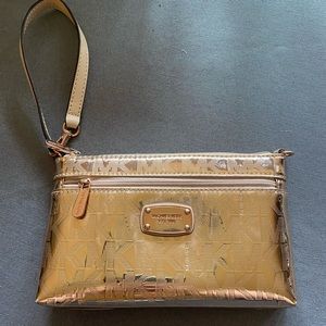 Michael Kors rose gold wristlet